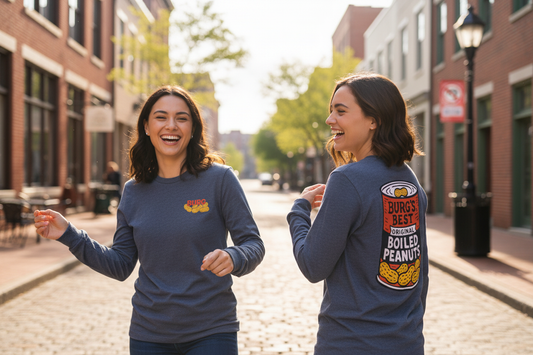 Two people showing front and back of Burg's Best Boiled Peanuts Long Sleeve