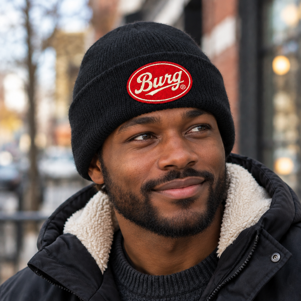 Black model wearing a BURG patch sherpa-lined cuffed beanie outdoors