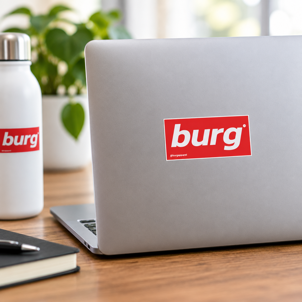Lifestyle shot of the Burg Supreme Style sticker on a laptop or bottle